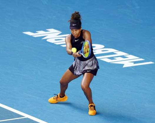 Tennis: Australian Open Naomi Osaka of Japan plays against Belinda Bencic of Switzerland in the third round of the women s singles at the Australian Open tennis tournament in Melbourne on Jan. 17, 2025. She retired from the match midway due to an injury.  A14AA0003994162P