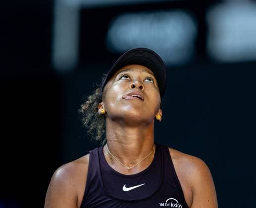 (250117) -- MELBOURNE, Jan. 17, 2025 -- Osaka Naomi reacts during the women s singles 3rd round match between Osaka Naomi of Japan and Belinda Bencic of Switzerland at Australian Open tennis tournament in Melbourne, Australia, Jan. 17, 2025. (Photo by Xinhua) (SP)AUSTRALIA-MELBOURNE-TENNIS-AUSTRALIAN OPEN-DAY 6 HuxJingchen 
