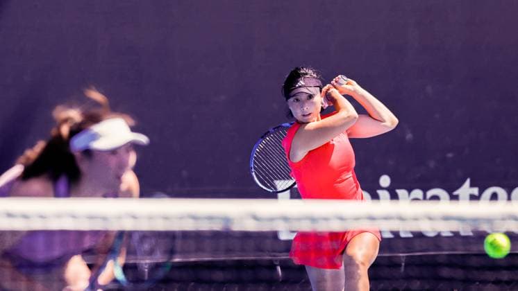 (250117) -- MELBOURNE, Jan. 17, 2025 -- Xu Yifan (R) Yang Zhaoxuan compete during the women s doubles second round match between Xu Yifan Yang Zhaoxuan of China and Hsieh Su-Wei (Chinese Taipe) Jelena Ostapenko (Latvia) at Australian Open tennis tournament in Melbourne, Australia, Jan. 17, 2025. (Photo by Xinhua) (SP)AUSTRALIA-MELBOURNE-TENNIS-AUSTRALIAN OPEN-DAY 6 ChuxChen 