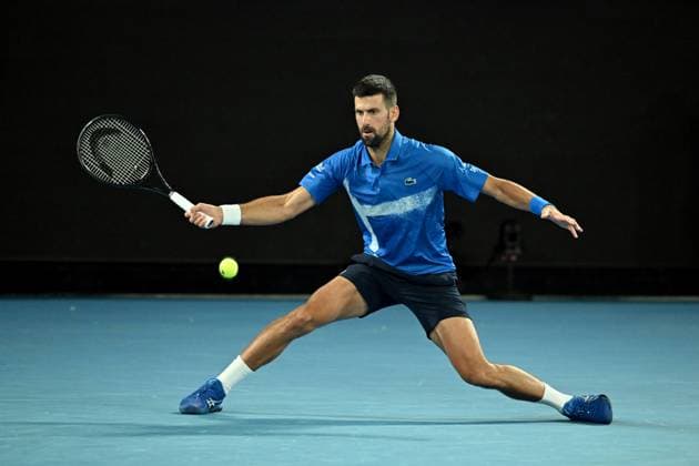 TENNIS AUSTRALIAN OPEN, Novak Djokovic of Serbia returns during his round three match against Tomas Machac of Czechia during the 2025 Australian Open at Melbourne Park in Melbourne, Friday, January 17, 2025. ( NO ARCHIVING, EDITORIAL USE ONLY, NO USE IN BOOKS WITHOUT CONSENT MELBOURNE VICTORIA AUSTRALIA  Copyright: xJAMESxROSSx 20250117152199564151