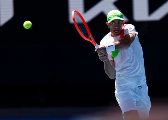 (250117) -- MELBOURNE, Jan. 17, 2025 -- Nuno Borges hits a return during the men s singles third round match between Carlos Alcaraz of Spain and Nuno Borges of Portugal at Australian Open tennis tournament in Melbourne, Australia, Jan. 17, 2025. ) (SP)AUSTRALIA-MELBOURNE-TENNIS-AUSTRALIAN OPEN-DAY 6 MaxPing 