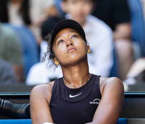 (250117) -- MELBOURNE, Jan. 17, 2025 -- Osaka Naomi reacts during the women s singles 3rd round match between Osaka Naomi of Japan and Belinda Bencic of Switzerland at Australian Open tennis tournament in Melbourne, Australia, Jan. 17, 2025. (Photo by Xinhua) (SP)AUSTRALIA-MELBOURNE-TENNIS-AUSTRALIAN OPEN-DAY 6 HuxJingchen 