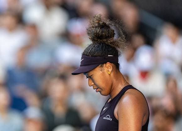 (250117) -- MELBOURNE, Jan. 17, 2025 -- Osaka Naomi reacts during the women s singles 3rd round match between Osaka Naomi of Japan and Belinda Bencic of Switzerland at Australian Open tennis tournament in Melbourne, Australia, Jan. 17, 2025. (Photo by Xinhua) (SP)AUSTRALIA-MELBOURNE-TENNIS-AUSTRALIAN OPEN-DAY 6 HuxJingchen 
