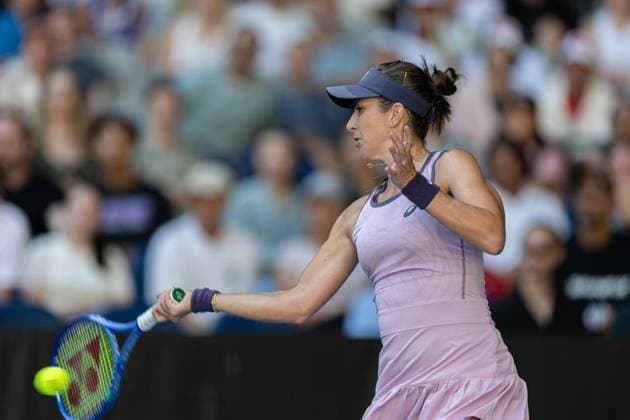 (250117) -- MELBOURNE, Jan. 17, 2025 -- Belinda Bencic hits a return during the women s singles 3rd round match between Osaka Naomi of Japan and Belinda Bencic of Switzerland at Australian Open tennis tournament in Melbourne, Australia, Jan. 17, 2025. (Photo by Xinhua) (SP)AUSTRALIA-MELBOURNE-TENNIS-AUSTRALIAN OPEN-DAY 6 HuxJingchen 