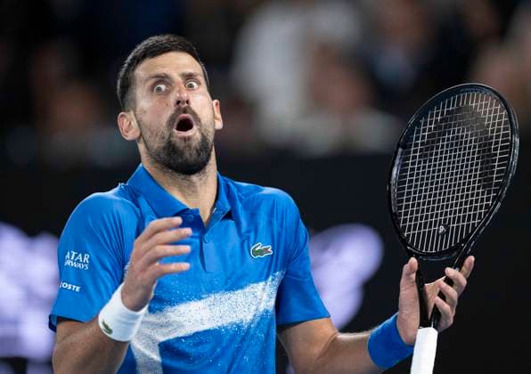 (250117) -- MELBOURNE, Jan. 17, 2025 -- Novak Djokovic reacts during the men s singles 3rd round match between Novak Djokovic of Serbia and Tomas Machac of the Czech Republic at Australian Open tennis tournament in Melbourne, Australia, Jan. 17, 2025. ) (SP)AUSTRALIA-MELBOURNE-TENNIS-AUSTRALIAN OPEN-DAY 6 LuixSiuxWai 
