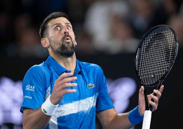 Sport Bilder des Tages (250117) -- MELBOURNE, Jan. 17, 2025 -- Novak Djokovic reacts during the men s singles 3rd round match between Novak Djokovic of Serbia and Tomas Machac of the Czech Republic at Australian Open tennis tournament in Melbourne, Australia, Jan. 17, 2025. ) (SP)AUSTRALIA-MELBOURNE-TENNIS-AUSTRALIAN OPEN-DAY 6 LuixSiuxWai 