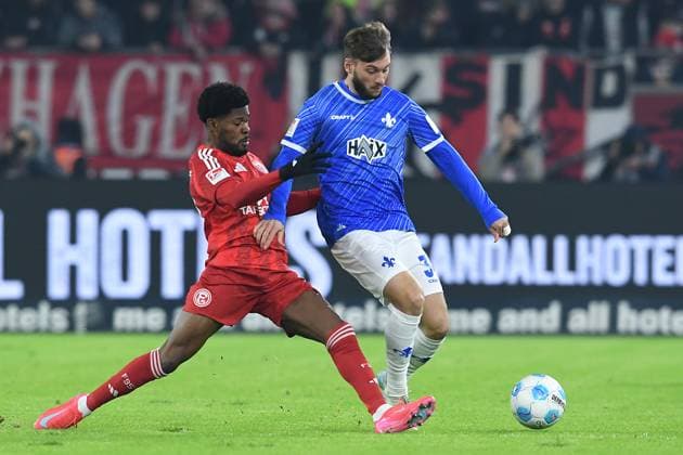 Soccer 2 Bundesliga 18 Matchday Fortuna Düsseldorf SV Darmstadt 98 on 17 01 2025 at Merkur Spiel Arena in Düsseldorf Moritz Broni Kwarteng Düsseldorf , left Kilian Julian Corredor Darmstadt , right DFL regulations prohibit any use of photographs as image sequences and or quasi video xRx