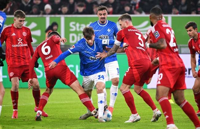 Football, 2 Bundesliga, Germany, Men, Season 2024 2025, Matchday 18, Merkur Spiel Arena Düsseldorf, Fortuna Düsseldorf SV Darmstadt Giovanni Haag F95 , Killian Corredor SVD , Andre Hoffmann F95 Action
