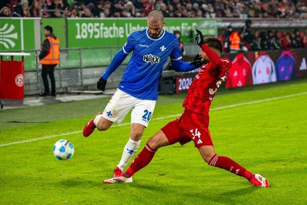 17 01 2025, Soccer 2 Bundesliga, Season 2024 2025, Matchday 18, Fortuna Duesseldorf vs SV Darmstadt 98 in the Merkur Spiel Arena in Duesseldorf duel between Aleksandar Vukotic SV Darmstadt 98, 20 and Nicolas Gavory Fortuna Duesseldorf, 34 Important note According to the regulations of the DFL German Football League and the DFB German Football Association, it is prohibited to utilize or have utilized photographs taken in the stadium and or of the match in the form of sequential images and or video-like photo series Foto Kirchner Media TH Copyright: xKirchner-Media THx
