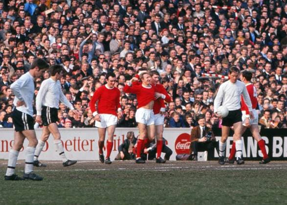 Football - 1967 1968 First Division - Fulham 0 Manchester United, ManU 4 United s Denis Law celebrates his goal with teammates Brian Kidd and John Aston at Craven Cottage. 