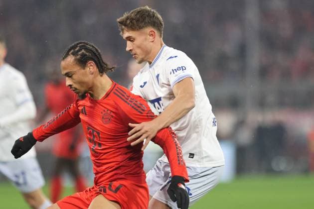 10 Leroy Sane red FCB vs 7 Tom Bischof Hoffenheim Action, duel, football 1 BL FC Bayern Munich TSG 1899 Hoffenheim 15 01 2025 Allianz Arena PHOTO Mladen Lackovic LakoPress