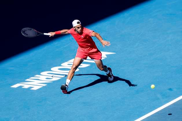 (250118) -- MELBOURNE, Jan. 18, 2025 -- Francisco Cerundolo hits a return during the men s singles 3rd round match between Alex de Minaur of Australia and Francisco Cerundolo of Argentina at Australian Open tennis tournament in Melbourne, Australia, Jan. 18, 2025. ) (SP)AUSTRALIA-MELBOURNE-TENNIS-AUSTRALIAN OPEN-DAY 7 MaxPing 