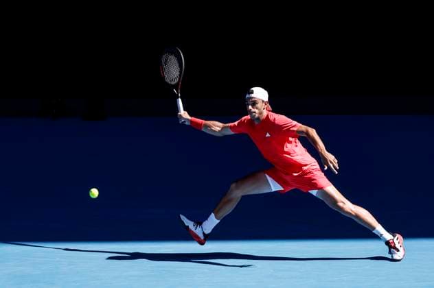 (250118) -- MELBOURNE, Jan. 18, 2025 -- Francisco Cerundolo hits a return during the men s singles 3rd round match between Alex de Minaur of Australia and Francisco Cerundolo of Argentina at Australian Open tennis tournament in Melbourne, Australia, Jan. 18, 2025. ) (SP)AUSTRALIA-MELBOURNE-TENNIS-AUSTRALIAN OPEN-DAY 7 MaxPing 