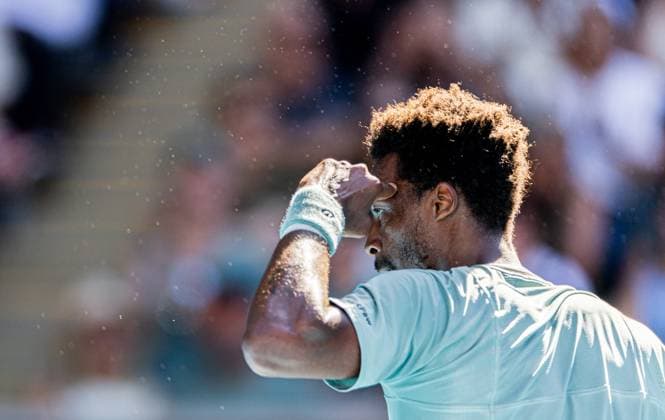 (250118) -- MELBOURNE, Jan. 18, 2025 -- Gael Monfils reacts during the men s singles 3rd round match between Taylor Fritz of the United States and Gael Monfils of France at Australian Open tennis tournament in Melbourne, Australia, Jan. 18, 2025. (Photo by Xinhua) (SP)AUSTRALIA-MELBOURNE-TENNIS-AUSTRALIAN OPEN-DAY 7 HuxJingchen 