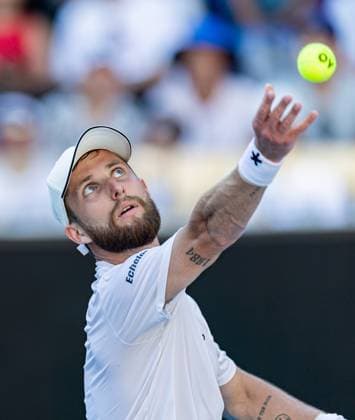 (250118) -- MELBOURNE, Jan. 18, 2025 -- Corentin Moutet serves during the men s singles 3rd round match between Learner Tien of the United States and Corentin Moutet of France at Australian Open tennis tournament in Melbourne, Australia, Jan. 18, 2025. (Photo by Xinhua) (SP)AUSTRALIA-MELBOURNE-TENNIS-AUSTRALIAN OPEN-DAY 7 HuxJingchen 