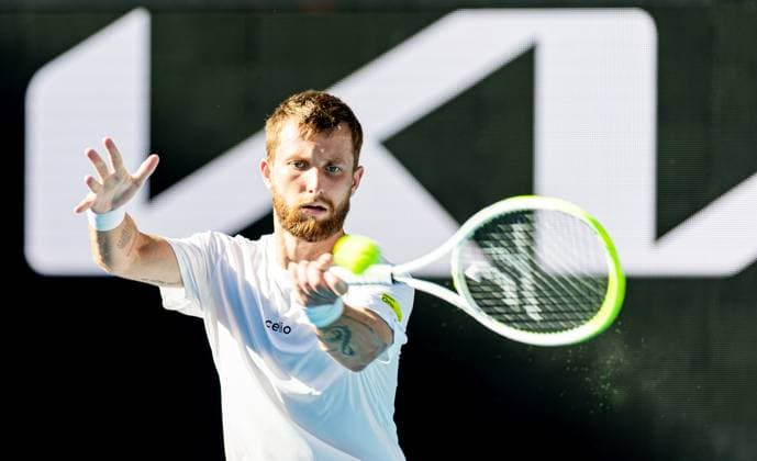 (250118) -- MELBOURNE, Jan. 18, 2025 -- Corentin Moutet hits a return during the men s singles 3rd round match between Learner Tien of the United States and Corentin Moutet of France at Australian Open tennis tournament in Melbourne, Australia, Jan. 18, 2025. (Photo by Xinhua) (SP)AUSTRALIA-MELBOURNE-TENNIS-AUSTRALIAN OPEN-DAY 7 HuxJingchen 