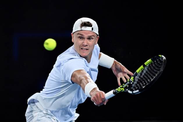 TENNIS AUSTRALIAN OPEN, Holger Rune of Denmark returns during his round three match against Miomir Kecmanovic of Serbia during the 2025 Australian Open at Melbourne Park in Melbourne, Saturday, January 18, 2025. ( NO ARCHIVING, EDITORIAL USE ONLY, NO USE IN BOOKS WITHOUT CONSENT MELBOURNE VICTORIA AUSTRALIA  Copyright: xJAMESxROSSx 20250118110212145014