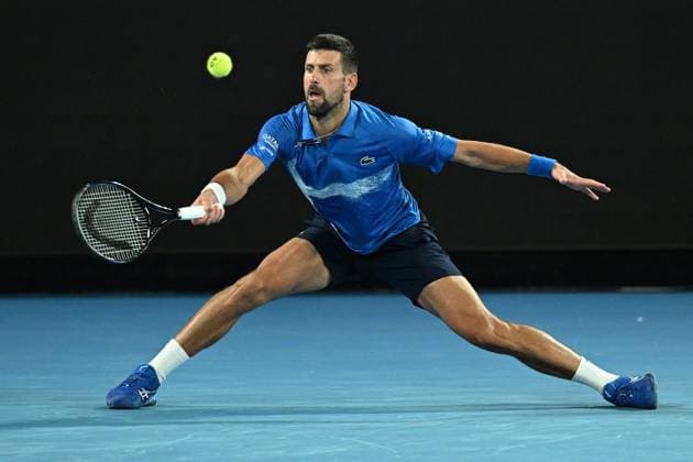 TENNIS AUSTRALIAN OPEN, Novak Djokovic of Serbia plays a shot during his round four match against Jiri Lehecka of the The Czech Republic during the 2025 Australian Open at Melbourne Park in Melbourne, Sunday, January 19, 2025. ( NO ARCHIVING, EDITORIAL USE ONLY, NO USE IN BOOKS WITHOUT CONSENT MELBOURNE VICTORIA AUSTRALIA  Copyright: xJAMESxROSSx 20250119194885373389