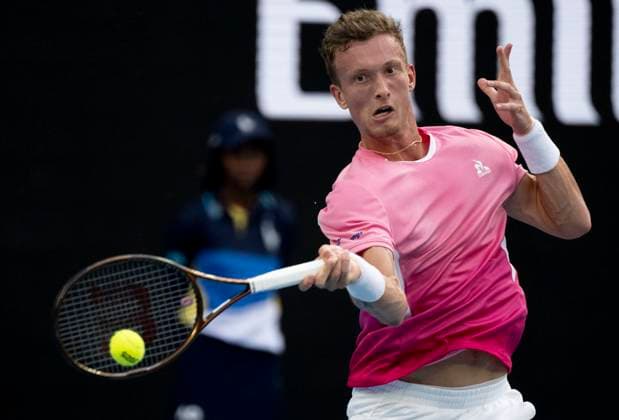 (250119) -- MELBOURNE, Jan. 19, 2025 -- Jiri Lehecka hits a return during the men s singles 4th round match between Novak Djokovic of Serbia and Jiri Lehecka of the Czech Republic at Australian Open tennis tournament in Melbourne, Australia, Jan. 19, 2025. ) (SP)AUSTRALIA-MELBOURNE-TENNIS-AUSTRALIAN OPEN-DAY 8 LuixSiuxWai 