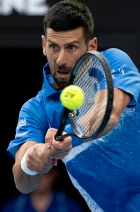 (250119) -- MELBOURNE, Jan. 19, 2025 -- Novak Djokovic hits a return during the men s singles 4th round match between Novak Djokovic of Serbia and Jiri Lehecka of the Czech Republic at Australian Open tennis tournament in Melbourne, Australia, Jan. 19, 2025. ) (SP)AUSTRALIA-MELBOURNE-TENNIS-AUSTRALIAN OPEN-DAY 8 LuixSiuxWai 