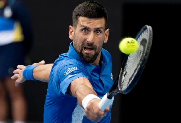 (250119) -- MELBOURNE, Jan. 19, 2025 -- Novak Djokovic hits a return during the men s singles 4th round match between Novak Djokovic of Serbia and Jiri Lehecka of the Czech Republic at Australian Open tennis tournament in Melbourne, Australia, Jan. 19, 2025. ) (SP)AUSTRALIA-MELBOURNE-TENNIS-AUSTRALIAN OPEN-DAY 8 LuixSiuxWai 