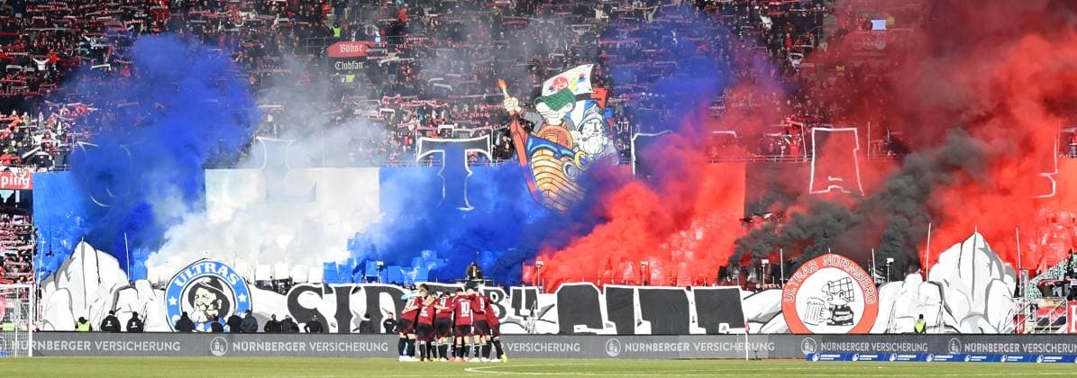 19 01 2025 Soccer season 2024 2025 2 Soccer Bundesliga 18 Matchday 1 FC Nürnberg FCN Club Karlsruher SC KSC Sportfoto Zink xwoxzix DFL regulations prohibit any use of photographs as image sequences and or quasi video only for editorial use Teamkreis Mannschaft Team FCN vor Clubfans Fans Fanblock Pyro Pyrotechnik Bengalos Bengalfackel Rauch Choreo Choreografie