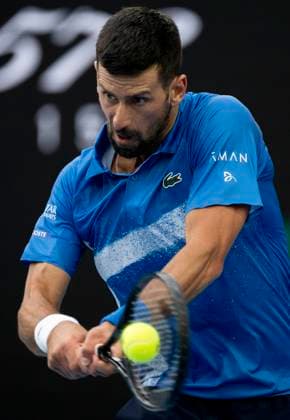 (250119) -- MELBOURNE, Jan. 19, 2025 -- Novak Djokovic hits a return during the men s singles 4th round match between Novak Djokovic of Serbia and Jiri Lehecka of the Czech Republic at Australian Open tennis tournament in Melbourne, Australia, Jan. 19, 2025. ) (SP)AUSTRALIA-MELBOURNE-TENNIS-AUSTRALIAN OPEN-DAY 8 LuixSiuxWai 