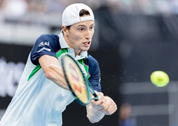 (250119) -- MELBOURNE, Jan. 19, 2025 -- Ugo Humbert hits a return during the men s singles 4th round match between Alexander Zverev of Germany and Ugo Humbert of France at Australian Open tennis tournament in Melbourne, Australia, Jan. 19, 2025. (Photo by Xinhua) (SP)AUSTRALIA-MELBOURNE-TENNIS-AUSTRALIAN OPEN-DAY 8 HuxJingchen 