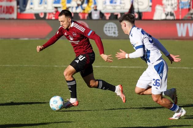 in duel, action, with Julian Justvan 10 1 FC Nuernberg , Rafael Pinto Pedrosa 36 Karlsruher SC , 1 FC Nuernberg vs Karlsruher SC, Soccer, 2 Bundesliga, 18 Matchday, 19 01 2025 DFB regulations prohibit any use of photographs as image sequences and or quasi video Nuernberg Bayern Germany Copyright: xkolbert-press MartinxAgüerax