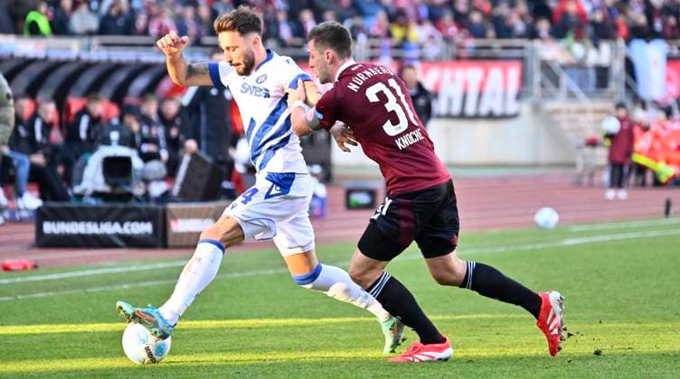 19 01 2025 Soccer season 2024 2025 2 Soccer Bundesliga 18 Matchday 1 FC Nürnberg FCN Club Karlsruher SC KSC Sportfoto Zink xwoxzix DFL regulations prohibit any use of photographs as image sequences and or quasi video only for editorial use Fabian Schleusener 24, Karlsruher SC KSC Robin Knoche 31, 1 FC Nürnberg FCN