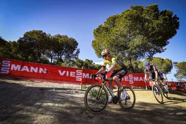 Belgian Wout van Aert and Dutch Pim Ronhaar pictured in action during the men s elite race at the cyclocross cycling event in Benidorm, Spain, Sunday 19 January 2025, stage 12 14 in the UCI World Cup competition. DAVIDxPINTENS  x110726988x