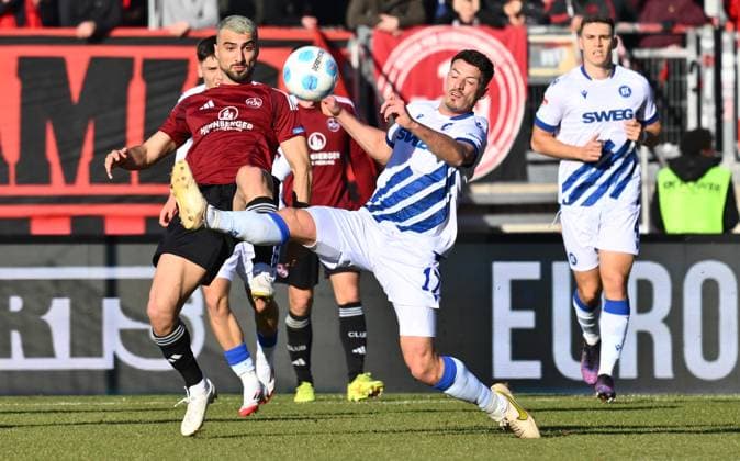 19 01 2025 Soccer season 2024 2025 2 Soccer Bundesliga 18 Matchday 1 FC Nürnberg FCN Club Karlsruher SC KSC Sportfoto Zink xwoxzix DFL regulations prohibit any use of photographs as image sequences and or quasi video only for editorial use Mahir Emreli 30, 1 FC Nürnberg FCN Nicolai Rapp 17, Karlsruher SC KSC