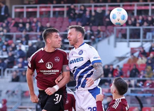 19 01 2025 Soccer season 2024 2025 2 Soccer Bundesliga 18 Matchday 1 FC Nürnberg FCN Club Karlsruher SC KSC Sportfoto Zink DaMa xdaxmax DFL regulations prohibit any use of photographs as image sequences and or quasi video only for editorial use Robin Knoche 31, 1 FC Nürnberg FCN in header duel with Marcel Franke 28, Karlsruher SC KSC