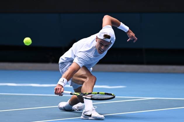 TENNIS AUSTRALIAN OPEN, Holger Rune of Denmark in action during his round 4 match against Jannik Sinner of Italy during the 2025 Australian Open at Melbourne Park in Melbourne, Monday, January 20, 2025. ( NO ARCHIVING, EDITORIAL USE ONLY, NO USE IN BOOKS WITHOUT CONSENT MELBOURNE VICTORIA AUSTRALIA  Copyright: xJAMESxROSSx 20250120120169558404