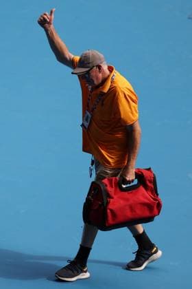 A handyman leaves the court after fixing the broken net during the fourth round match between Rune and Sinner Australian Open, Day Nine, Tennis, Melbourne Park, Melbourne, Australia - 20 Jan 2025  Copyright: xEllaxLing Shutterstockx 15105040ax