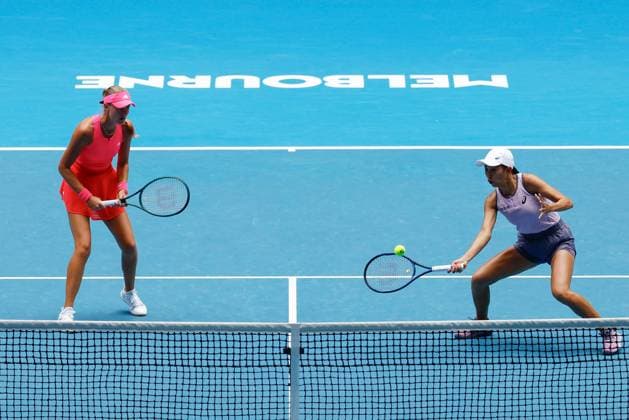 (250120) -- MELBOURNE, Jan. 20, 2025 -- Zhang Shuai (R) Kristina Mladenovic compete during the women s doubles third round match between Zhang Shuai (China) Kristina Mladenovic (France) and Chan Hao-Ching (Chinese Taipei) Lyudmyla Kichenok (Ukraine) at Australian Open tennis tournament in Melbourne, Australia, Jan. 20, 2025. (Photo by Xinhua) (SP)AUSTRALIA-MELBOURNE-TENNIS-AUSTRALIAN OPEN-DAY 9 ChuxChen 