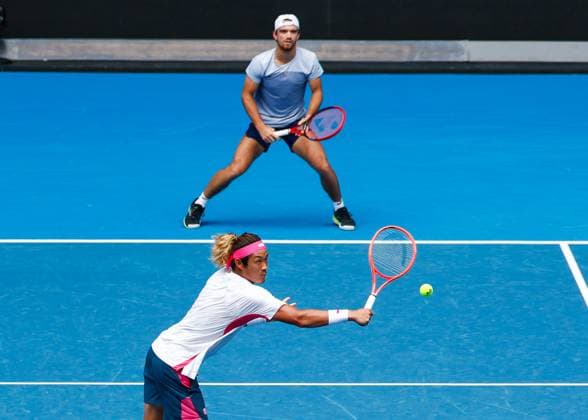 (250120) -- MELBOURNE, Jan. 20, 2025 -- Zhang Zhizhen (bottom) Tomas Machac compete during the men s doubles third round match between Zhang Zhizhen (China) Tomas Machac (the Czech Republic) and Hugo Nys (Monaco) Edouard Roger-Vasselin (France) at Australian Open tennis tournament in Melbourne, Australia, Jan. 20, 2025. (Photo by Xinhua) (SP)AUSTRALIA-MELBOURNE-TENNIS-AUSTRALIAN OPEN-DAY 9 ChuxChen 