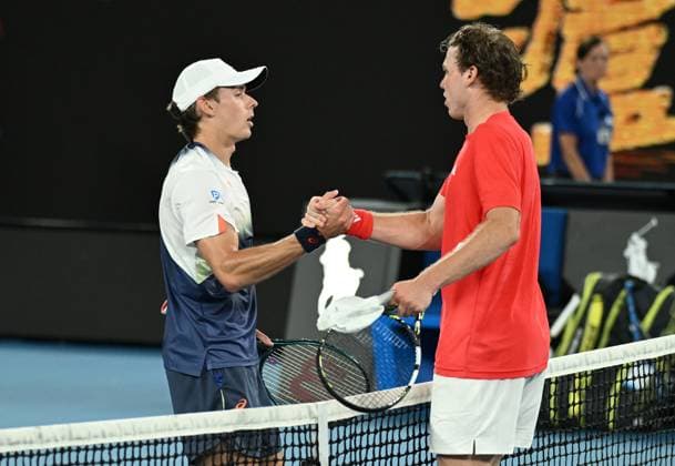 TENNIS AUSTRALIAN OPEN, Alex De Minaur of Australia (r) after winning his round 4 match against Alex Michelsen of USA during the 2025 Australian Open at Melbourne Park in Melbourne, Monday, January 20, 2025. ( NO ARCHIVING, EDITORIAL USE ONLY, NO USE IN BOOKS WITHOUT CONSENT MELBOURNE VICTORIA AUSTRALIA  Copyright: xJAMESxROSSx 20250120126636371728