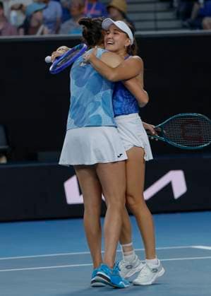 (250120) -- MELBOURNE, Jan. 20, 2025 -- Kamilla Rakhimova (R) Sara Sorribes Tormo celebrate winning the women s doubles third round match between Wang Xinyu Zheng Saisai of China and Kamilla Rakhimova (Russia) Sara Sorribes Tormo (Spain) at Australian Open tennis tournament in Melbourne, Australia, Jan. 20, 2025. (Photo by Xinhua) (SP)AUSTRALIA-MELBOURNE-TENNIS-AUSTRALIAN OPEN-DAY 9 ChuxChen 