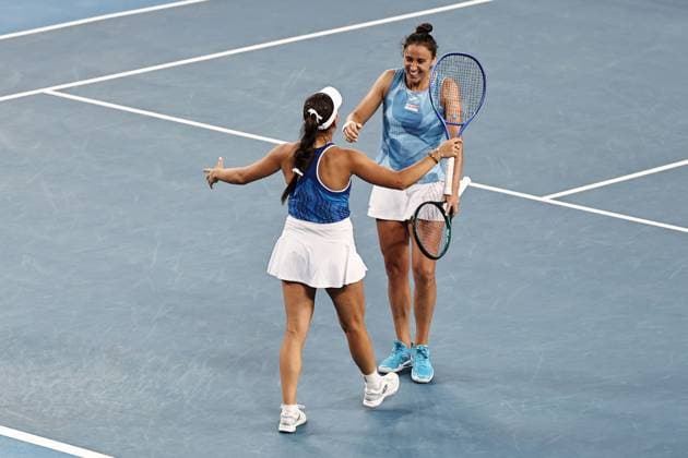 Kamilla Rakhimova white cap , RUS, and Sara Sorribes Tormo no cap , ESP, during womenÂs doubles at 2025 Australian Open in Melbourne, 20 01 2025