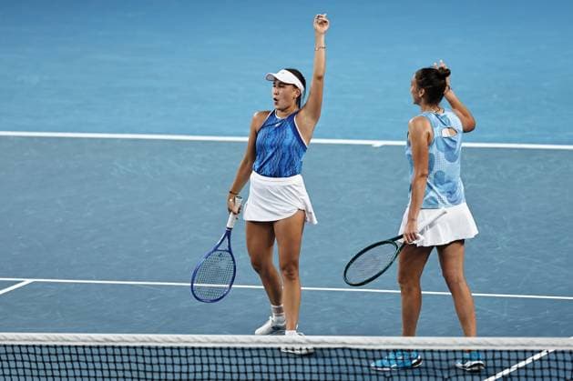 Kamilla Rakhimova white cap , RUS, and Sara Sorribes Tormo no cap , ESP, during womenÂs doubles at 2025 Australian Open in Melbourne, 20 01 2025