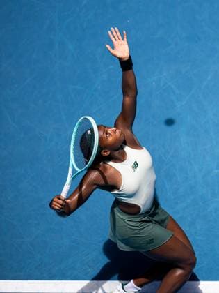 (250121) -- MELBOURNE, Jan. 21, 2025 -- Coco Gauff serves during the women s singles quarterfinals match between Coco Gauff of the United States and Paula Badosa of Spain at the Australian Open tennis tournament in Melbourne, Australia, Jan. 21, 2025. (Photo by Xinhua) (SP)AUSTRALIA-MELBOURNE-TENNIS-AUSTRALIAN OPEN-DAY 10 HuxJingchen 