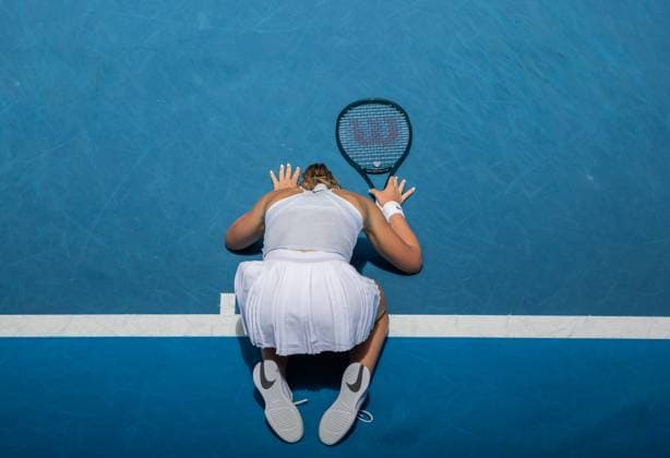 (250121) -- MELBOURNE, Jan. 21, 2025 -- Paula Badosa celebrates after winning the women s singles quarterfinals match between Coco Gauff of the United States and Paula Badosa of Spain at the Australian Open tennis tournament in Melbourne, Australia, Jan. 21, 2025. (Photo by Xinhua) (SP)AUSTRALIA-MELBOURNE-TENNIS-AUSTRALIAN OPEN-DAY 10 HuxJingchen 