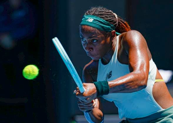 (250121) -- MELBOURNE, Jan. 21, 2025 -- Coco Gauff hits a return during the women s singles quarterfinals match between Coco Gauff of the United States and Paula Badosa of Spain at the Australian Open tennis tournament in Melbourne, Australia, Jan. 21, 2025. (Photo by Xinhua) (SP)AUSTRALIA-MELBOURNE-TENNIS-AUSTRALIAN OPEN-DAY 10 ChuxChen 