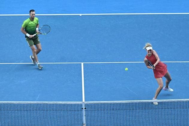 TENNIS AUSTRALIAN OPEN, Michael Venus and Erin Routliffe of New Zealand during their Mixed doubles 1 4 final match against Asia Muhammad of USA and Andres Molteni of Argentina during the 2025 Australian Open at Melbourne Park in Melbourne, Tuesday, January 21, 2025. ( NO ARCHIVING, EDITORIAL USE ONLY, NO USE IN BOOKS WITHOUT CONSENT MELBOURNE VICTORIA AUSTRALIA  Copyright: xLUKASxCOCHx 20250121193970877906