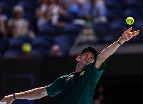 (250121) -- MELBOURNE, Jan. 21, 2025 -- Tommy Paul serves during the men s singles quarterfinal match between Alexander Zverev of Germany and Tommy Paul of the United States at Australian Open tennis tournament in Melbourne, Australia, Jan. 21, 2025. ) (SP)AUSTRALIA-MELBOURNE-TENNIS-AUSTRALIAN OPEN-DAY 10 MaxPing 