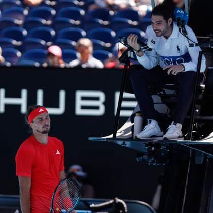 (250121) -- MELBOURNE, Jan. 21, 2025 -- Alexander Zverev (L) argues with the referee during the men s singles quarterfinal match between Alexander Zverev of Germany and Tommy Paul of the United States at Australian Open tennis tournament in Melbourne, Australia, Jan. 21, 2025. ) (SP)AUSTRALIA-MELBOURNE-TENNIS-AUSTRALIAN OPEN-DAY 10 MaxPing 