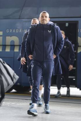 GNK Dinamo Zagreb depart for London Arijan Ademi of Dinamo Zagreb arrive at Franjo Tudjman International Airport before departing to London on January 21, 2025. in Zagreb, Croatia. Dinamo Zagreb will play against Arsenal in the UEFA Champions League.  LukaxStanzl PIXSELL