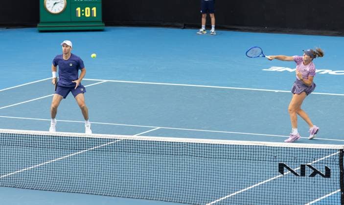 (250121) -- MELBOURNE, Jan. 21, 2025 -- Olivia Gadecki (R) John Peers compete during the mixed doubles quarterfinal between Zhang Shuai (China) Rohan Bopanna (India) and Olivia Gadecki John Peers of Australia at Australian Open tennis tournament in Melbourne, Australia, Jan. 21, 2025. (Photo by Xinhua) (SP)AUSTRALIA-MELBOURNE-TENNIS-AUSTRALIAN OPEN-DAY 10 HuxJingchen 