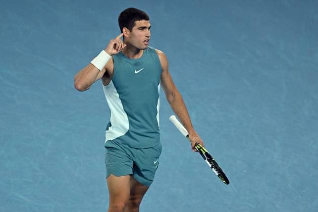 TENNIS AUSTRALIAN OPEN, Carlos Alcaraz of Spain reacts during his 1 4 final match against Novak Djokovic of Serbia during the 2025 Australian Open at Melbourne Park in Melbourne, Tuesday, January 21, 2025. NO ARCHIVING, EDITORIAL USE ONLY, NO USE IN BOOKS WITHOUT CONSENT MELBOURNE VICTORIA AUSTRALIA  Copyright: xLUKASxCOCHx 20250121175862370096